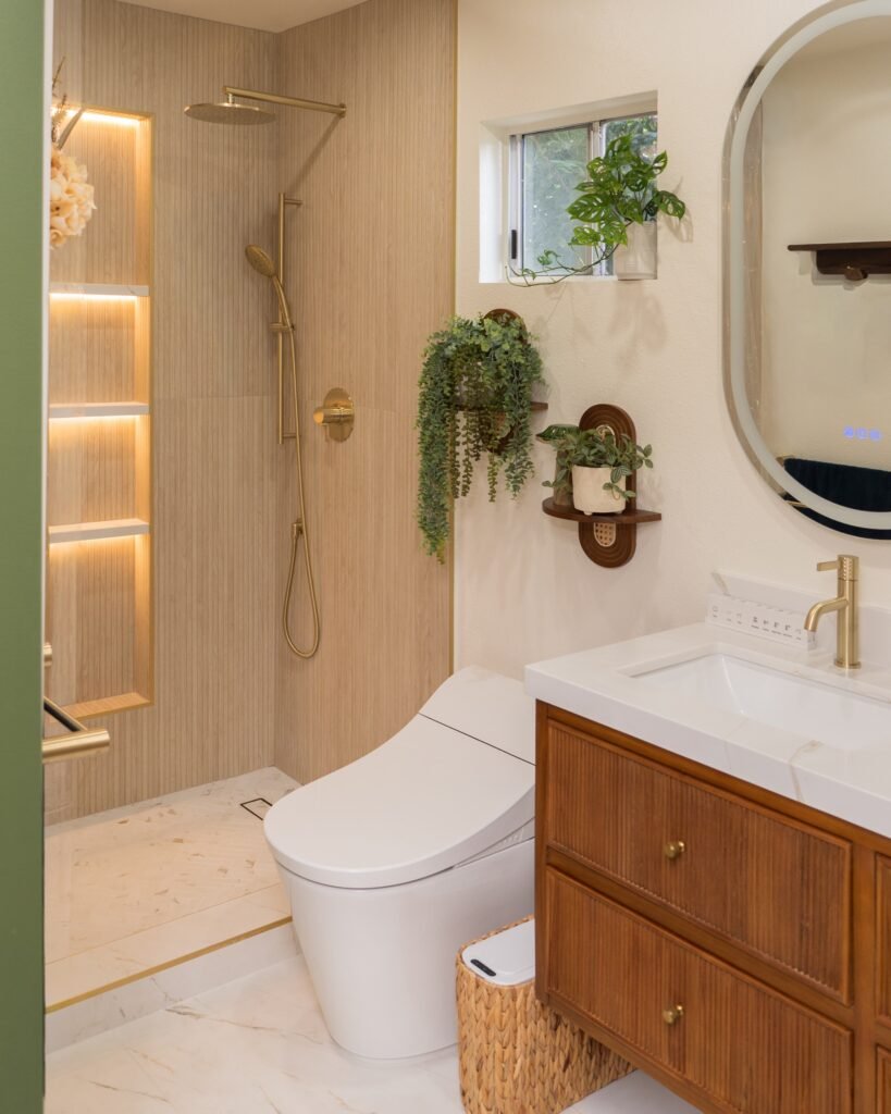 Full bathroom from the doorway: curbless walk-in shower, smart toilet and floating wood vanity